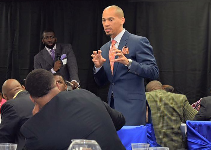 Michael Campbell speaking to COGIC churches